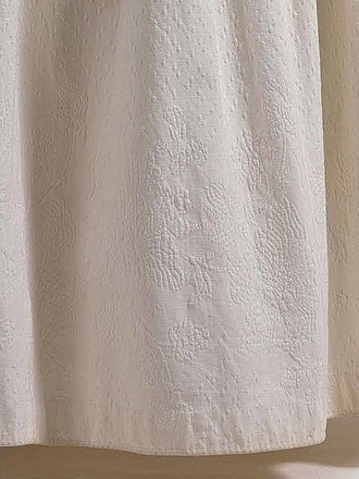 white 19th century example of marcella or 'Marseile' embroidery from Marseilles in France.