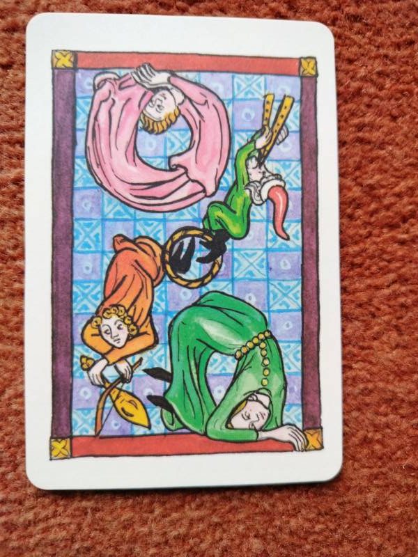 Card back image from Anastasia Kashian's Marginal Lenormand, published by Red Feather.